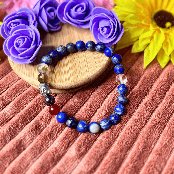 Natural stone bracelet for students and professionals on a textured surface with flowers in the background